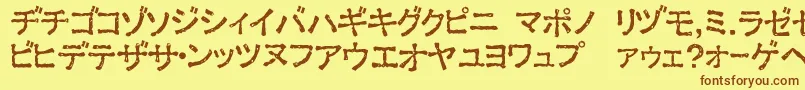 ExKata1-Schriftart – Braune Schriften auf gelbem Hintergrund