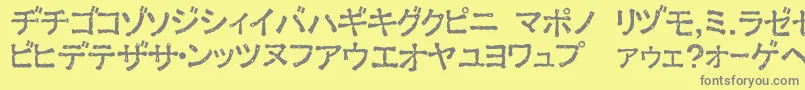 ExKata1-Schriftart – Graue Schriften auf gelbem Hintergrund
