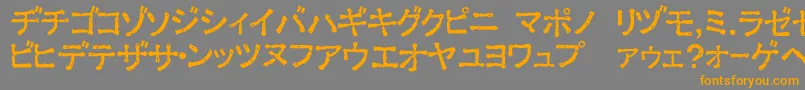 フォントExKata1 – オレンジの文字は灰色の背景にあります。