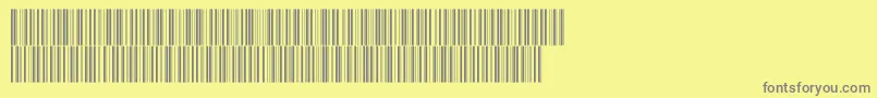 Intp36dmtt-Schriftart – Graue Schriften auf gelbem Hintergrund