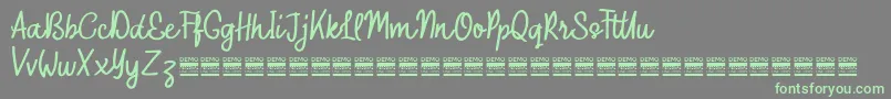 OuterlordDemo Font – Green Fonts on Gray Background