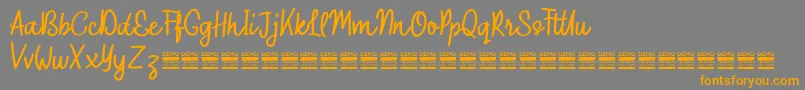 Шрифт OuterlordDemo – оранжевые шрифты на сером фоне