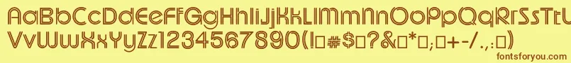 Uptightc Font – Brown Fonts on Yellow Background