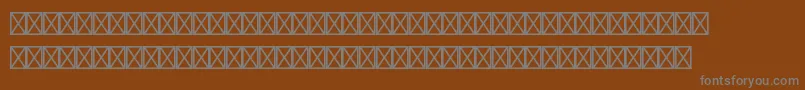 Audiopiltstd Font – Gray Fonts on Brown Background