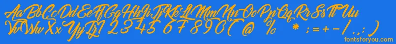 GoldfingerKingdom Font – Orange Fonts on Blue Background