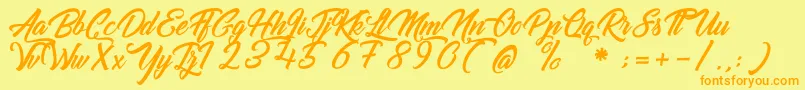 GoldfingerKingdom Font – Orange Fonts on Yellow Background