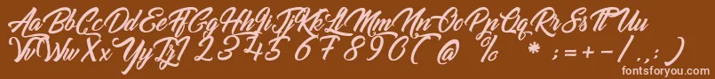 GoldfingerKingdom Font – Pink Fonts on Brown Background