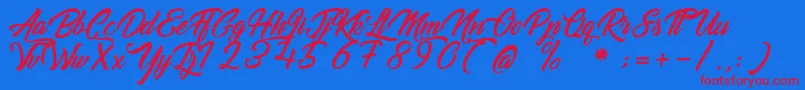 GoldfingerKingdom Font – Red Fonts on Blue Background