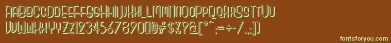 フォントMonicassalonshadownf – 緑色の文字が茶色の背景にあります。