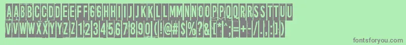 MoreNewsFromNowhere-Schriftart – Graue Schriften auf grünem Hintergrund