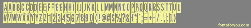 MoreNewsFromNowhere Font – Yellow Fonts on Gray Background