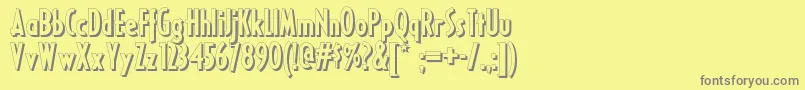Ricksamericannf-fontti – harmaat kirjasimet keltaisella taustalla