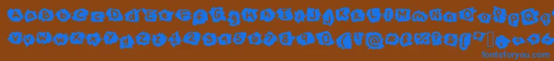 MissTerious Font – Blue Fonts on Brown Background