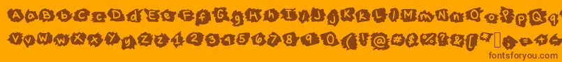 MissTerious-fontti – ruskeat fontit oranssilla taustalla