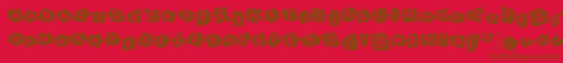 MissTerious-fontti – ruskeat fontit punaisella taustalla