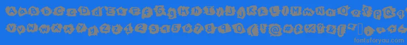 フォントMissTerious – 青い背景に灰色の文字