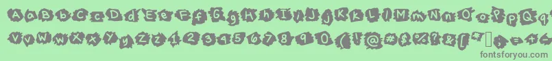 フォントMissTerious – 緑の背景に灰色の文字