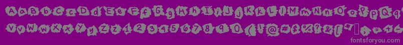 MissTerious-fontti – harmaat kirjasimet violetilla taustalla