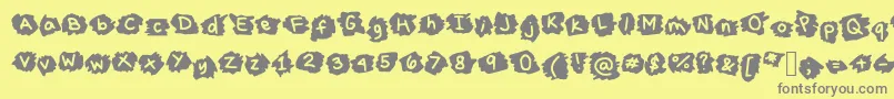 MissTerious-Schriftart – Graue Schriften auf gelbem Hintergrund