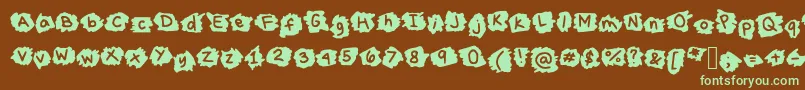 MissTerious-fontti – vihreät fontit ruskealla taustalla