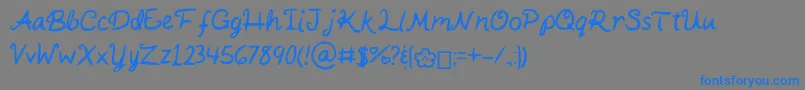 Czcionka KaitSHandwriting – niebieskie czcionki na szarym tle