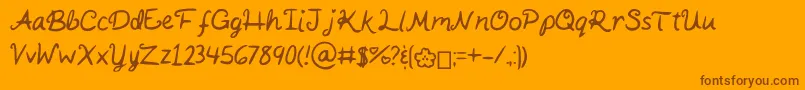 Fonte KaitSHandwriting – fontes marrons em um fundo laranja