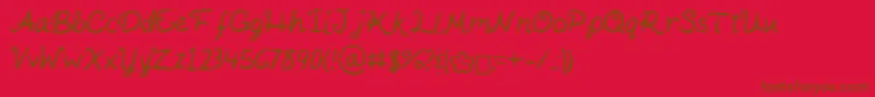 Fonte KaitSHandwriting – fontes marrons em um fundo vermelho