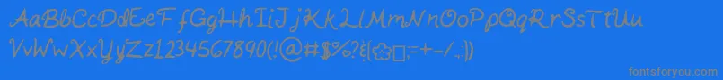 Czcionka KaitSHandwriting – szare czcionki na niebieskim tle