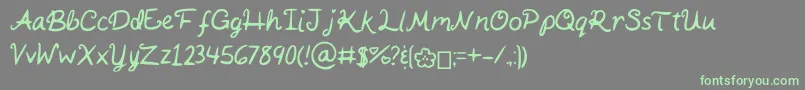 フォントKaitSHandwriting – 灰色の背景に緑のフォント