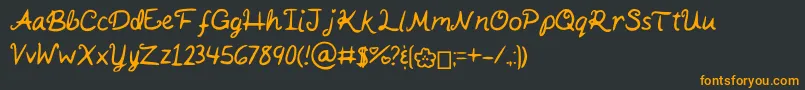 フォントKaitSHandwriting – 黒い背景にオレンジの文字