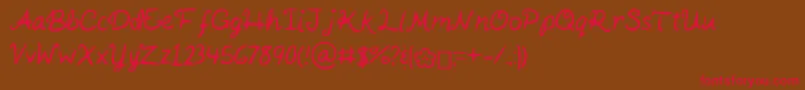 KaitSHandwriting-Schriftart – Rote Schriften auf braunem Hintergrund