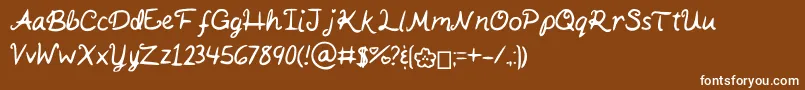 Fonte KaitSHandwriting – fontes brancas em um fundo marrom