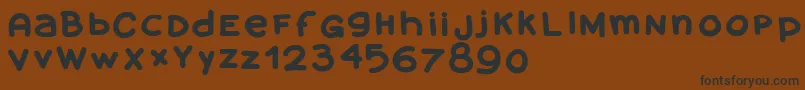Amanoblaxtendida Font – Black Fonts on Brown Background