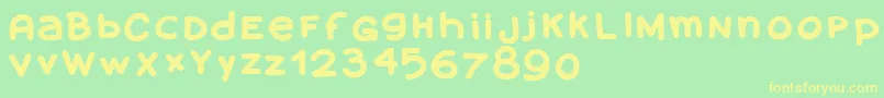 フォントAmanoblaxtendida – 黄色の文字が緑の背景にあります