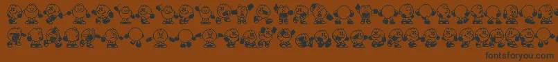Fonte Pacman – fontes pretas em um fundo marrom