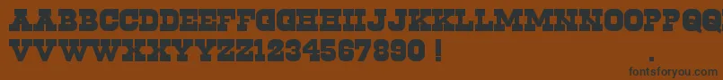 Cowboys2.0-Schriftart – Schwarze Schriften auf braunem Hintergrund