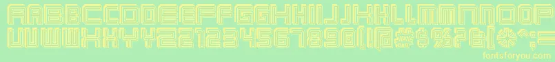 フォントKarnivos – 黄色の文字が緑の背景にあります