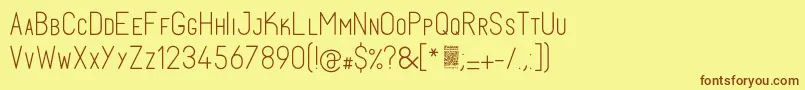 フォントFabiolosmallcapLight – 茶色の文字が黄色の背景にあります。