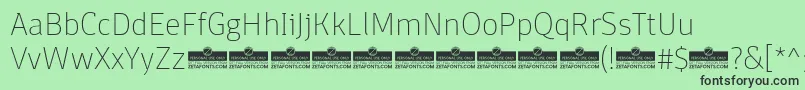 DomotikaThinTrial Font – Black Fonts on Green Background