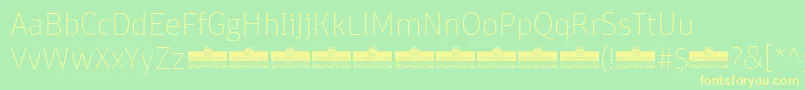 DomotikaThinTrial Font – Yellow Fonts on Green Background