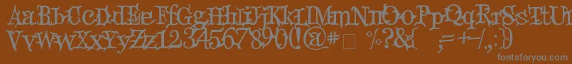 DevilsSnare Font – Gray Fonts on Brown Background