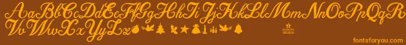 ChristmasTimePersonalUse-Schriftart – Orangefarbene Schriften auf braunem Hintergrund