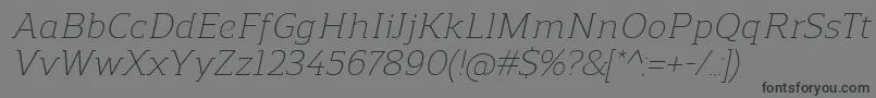 Шрифт ReganslabLightitalic – чёрные шрифты на сером фоне