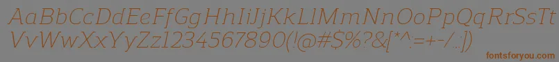 ReganslabLightitalic-fontti – ruskeat fontit harmaalla taustalla