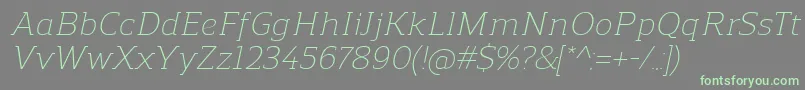フォントReganslabLightitalic – 灰色の背景に緑のフォント