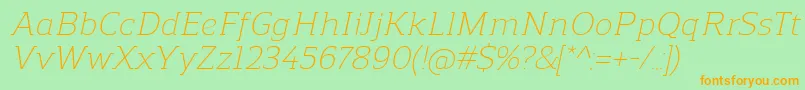 ReganslabLightitalic-fontti – oranssit fontit vihreällä taustalla