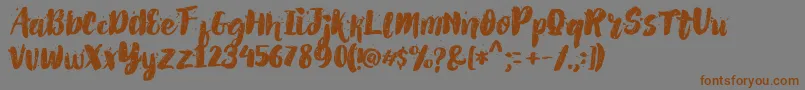 AlexdirteBrushFont-Schriftart – Braune Schriften auf grauem Hintergrund