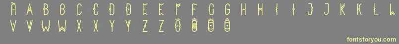 Loco Font – Yellow Fonts on Gray Background