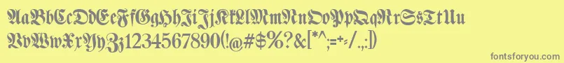 フォントKlaberfraktur – 黄色の背景に灰色の文字