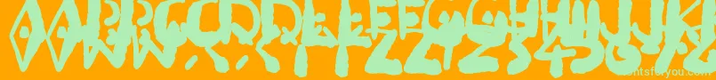 フォントInkbleeda – オレンジの背景に緑のフォント